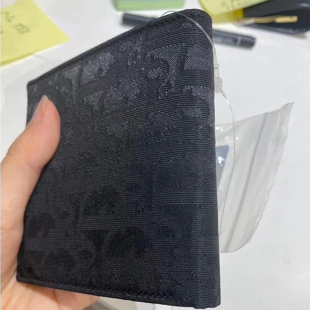 Dior black compact wallet unused item